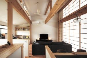 リビングは天井吹き抜けののびやかな空間。南北に設けられた高窓（ハイサイドライト）から光と風がたっぷりと導かれる。